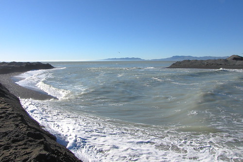 Taumutu by Seabird NZ, The artificial outlet of Lake Ellesmere into the Pacific Ocean, opened at the time of the shot. The 