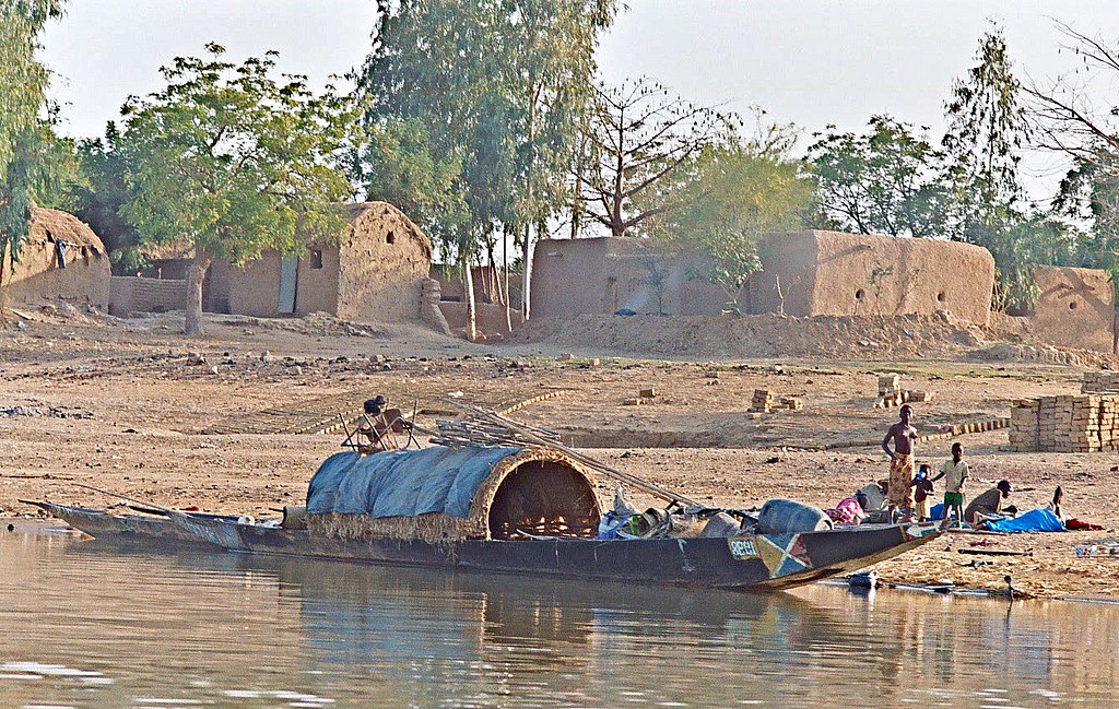 Africa-Mali-Niger river with village transport boat