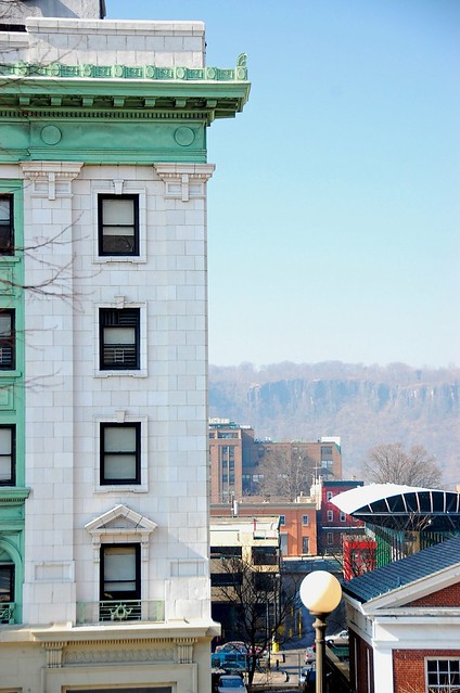 Palisades side -by-side with building in Downtown Yonkers, N.Y.
