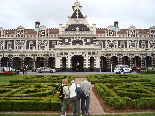 Complete strangers in front of the Dunedin Railway Station