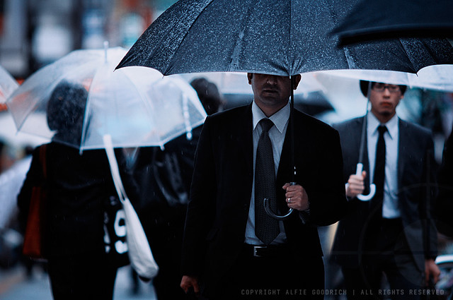 Salarymen in the rain; Hamamatsucho, Tokyo
