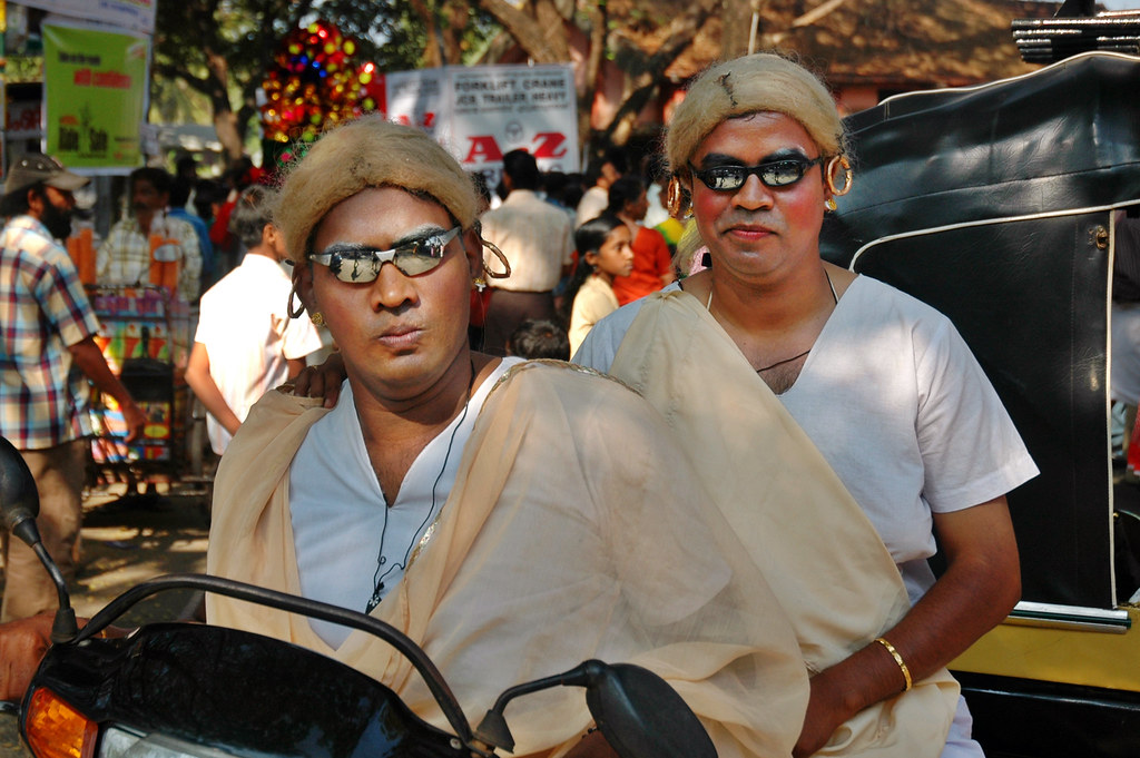 Two Riders Dressed in Shades on a Honda Scooter - Fort Kochi Carnival !! by Anoop Negi
