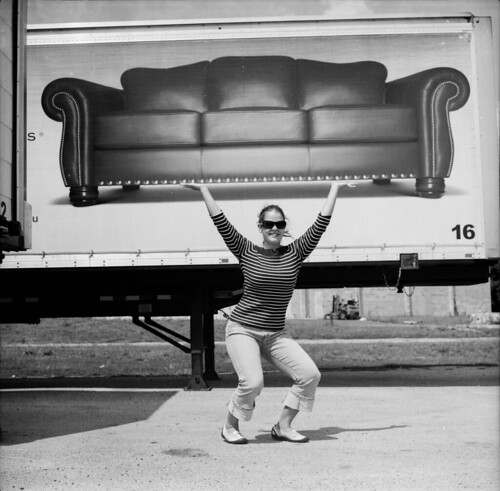 amanda lifts a couch