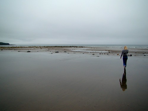 Reflection by James B Currie, Photo taken at Mavilette Beach, Nova Scotia.people reflection beach water sand coudy