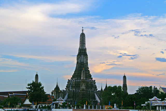 Wat Arun, the temple of dawn at dusk on the banks of the Chao Phraya river in Bangkok, Thailand