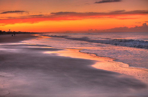 orange sun beach water sunrise sand waves glow northcarolina oakisland