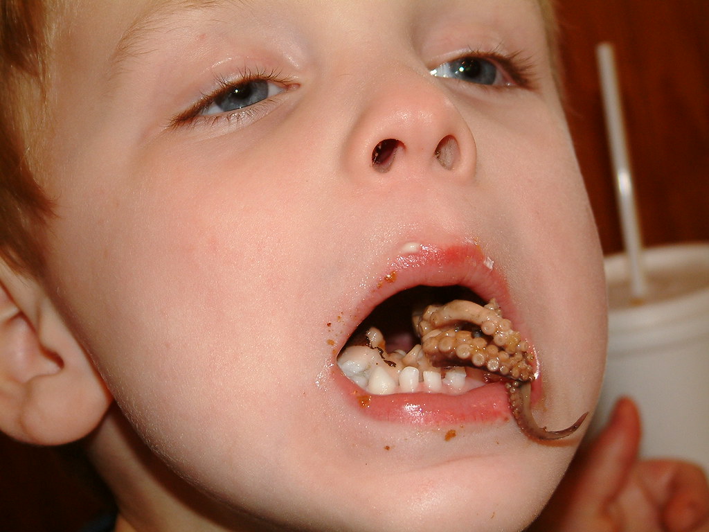The Grossest Picture of a Kid, ever | Gabe eating baby octop… | Flickr