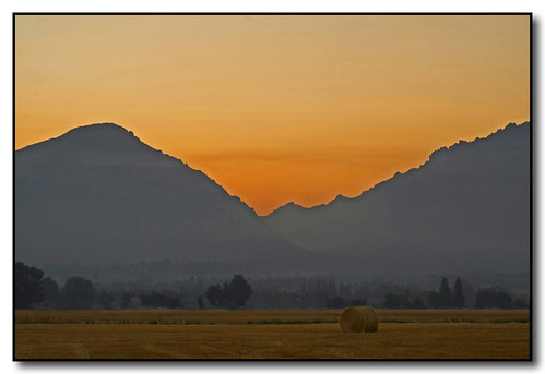 Blodgett Canyon Sunset by Roger Lynn, featuring smoke from the Kootenai Creek fire that is filling the valley
<i>(note: I reprocessed thi
