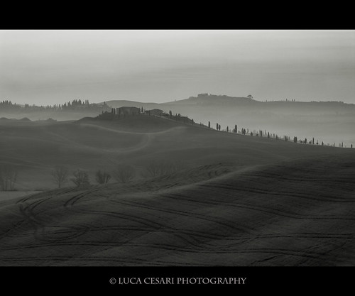 Misty hills at sunrise by Luca Cesari Photography