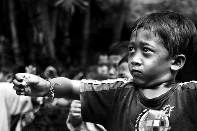 Ubud, Bali - Boy undergoing tough Warrior Dance training