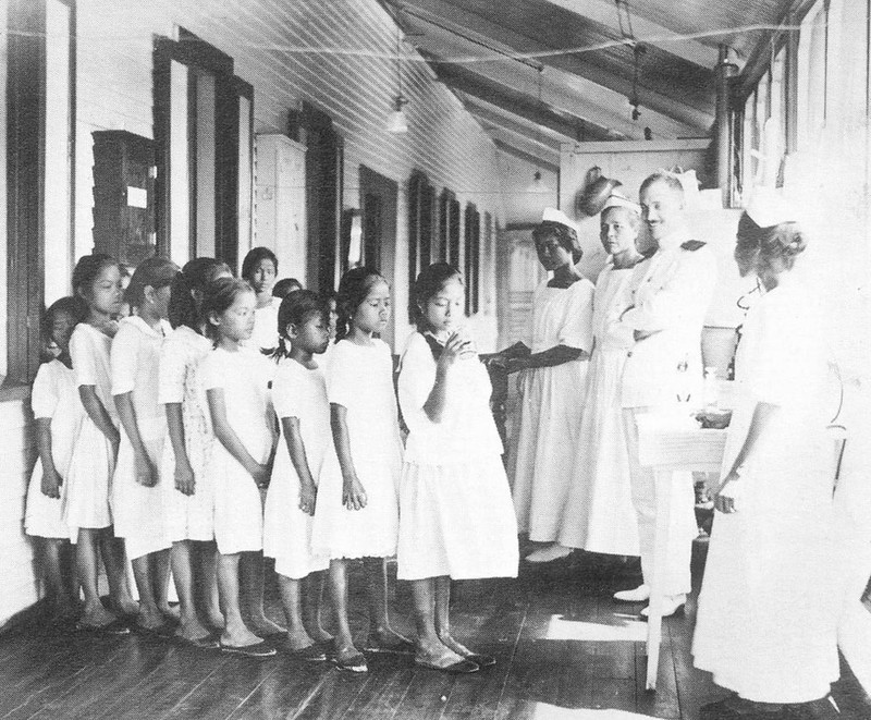 Schoolchildren lining up for annual hookworm treatment, 1900-1940.

Pedro C. Sanchez/Anne Hattori