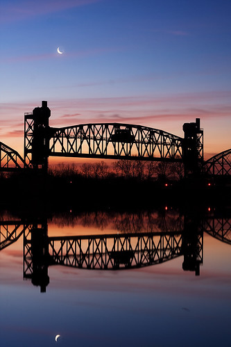 old railroad bridge blue winter sky moon reflection abandoned water silhouette rock metal clouds sunrise canon river island eos 50mm early still interesting iron long exposure quiet little clayton steel smooth january wells calm symmetry explore hour symmetric arkansas thumbsup f18 2009 twothumbsup bigmomma 40d img1422 photofaceoffplatinum pfogold thechallengefactory