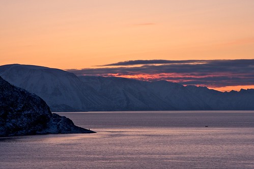 Sunset fishing by Torbein, The crew of the LNG-tanker  used a small dingy to try their fishing luck by the "Helmet"ge