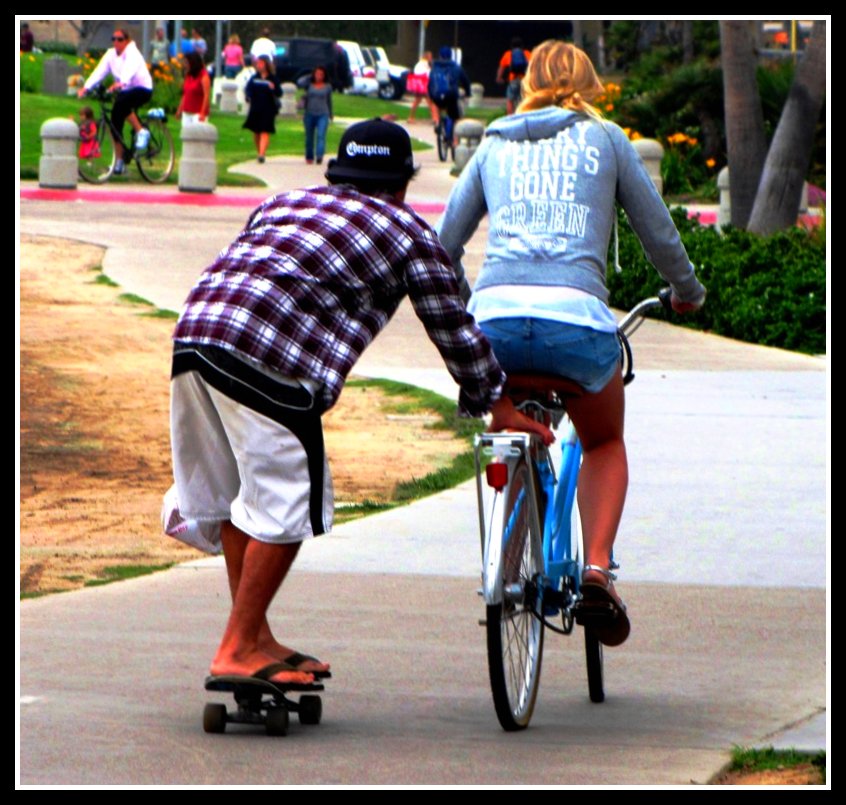 Skateboarding Hitchhiker, Mission Bay Boardwalk, San Diego, California