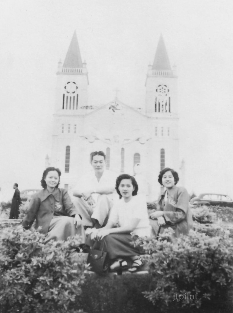 Baguio Cathedral, a group of four in front, unknown date.  I would guess late 1940s or 1950s