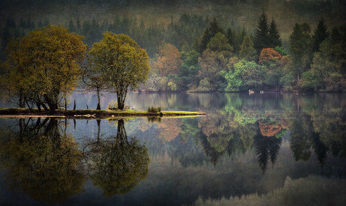 Loch Ard slowly pulls on its Autumn coat... by ouldm01