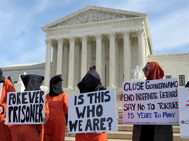 Close Guantánamo placards outside the Supreme Court, Jan. 11, 2017