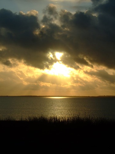 ocean water clouds sunrise gold horizon story chiaroscuro