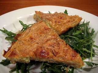 Spaghetti frittata with baby wild arugula