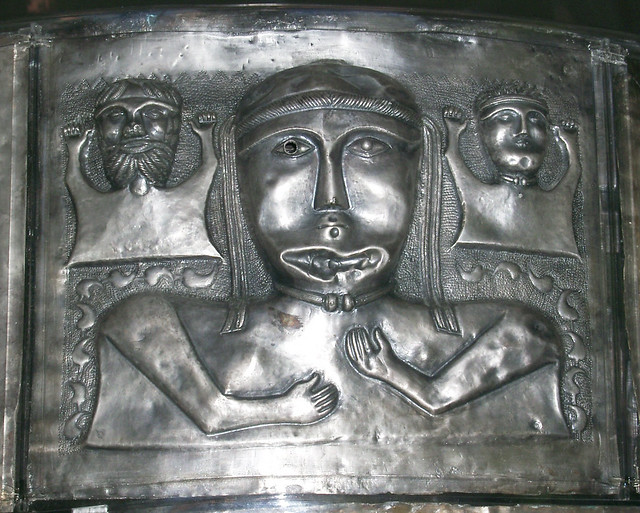 celtic goddess flanked by two male deities