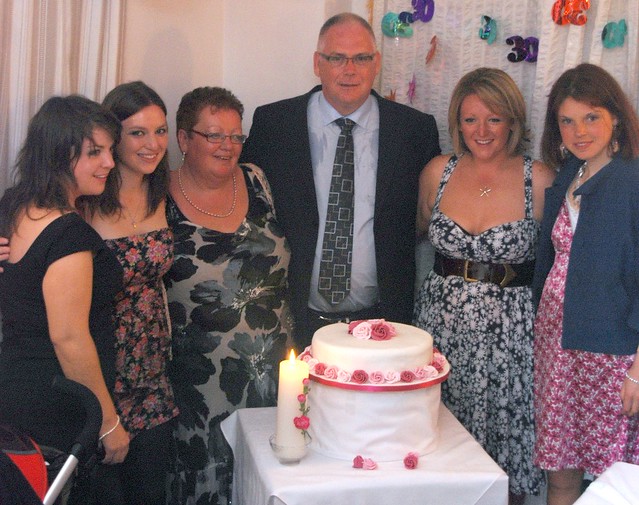 Family around the cake