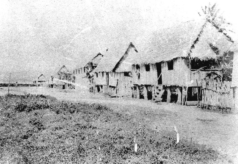 This historic photo shows thatched homes in the village of Sumay. Several of the residents were relocated to Santa Rita after WWII.

Charles D. Lemkuhl/Micronesian Seminar
