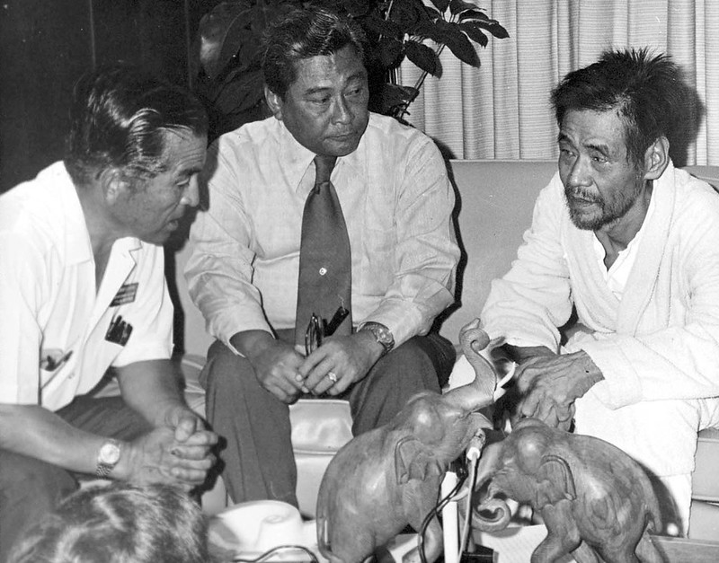 Gov. Carlos Camacho, center, and another man talk with WWII Japanese straggler Sgt. Shoichi Yokoi, right, during a 1972 interview. Yokoi was discovered in Talo’fo’fo's/Talofofo's jungles after 28 years of hiding. Courtesy of the Micronesian Area Research Center (MARC)