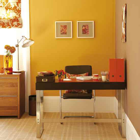 Bright, modern office: Orange paint + chocolate-brown accents