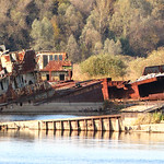Waiting to sink, rusty hulls at Chernobyl