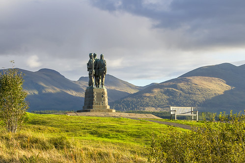 the sun sets commando memorial spean bridge scottish highlands overlooking tributes lost fallen commandos recent more dated statues stand stark backdrop ben nevis aonach mòr category a listed monument scotland dedicated men british forces world war ii situated village overlooks training areas depot established 942 achnacarry castle unveiled queen mother united kingdom tourist attraction kev gregory canon 7d scenic mountain