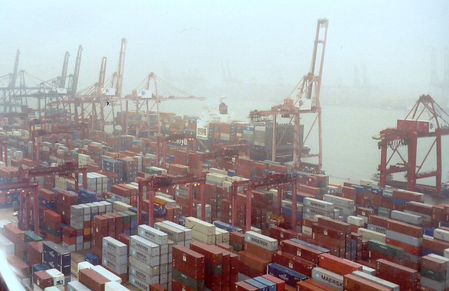 Modern Terminals and P&O Nedlloyd ship in fog and rain, Hong Kong