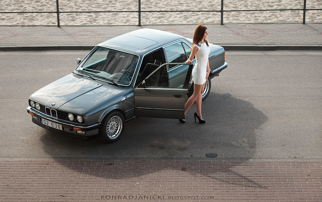 BMW E30 sedan classic with a woman
