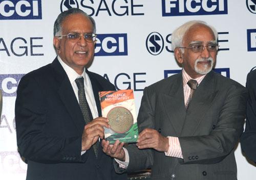 Shri M. Hamid Ansari, Vice President of India releasing the Book titled 