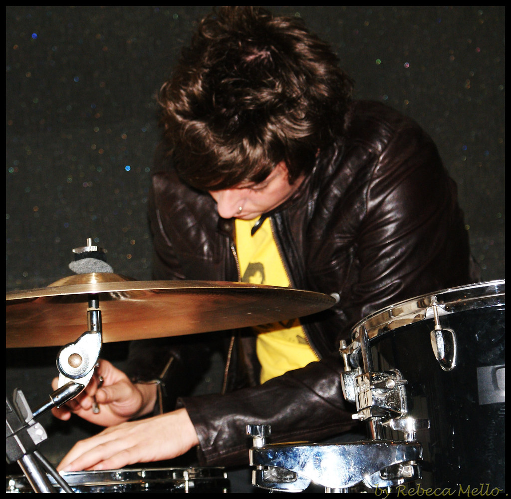 Tuning the drums.. by Rebeca Mello