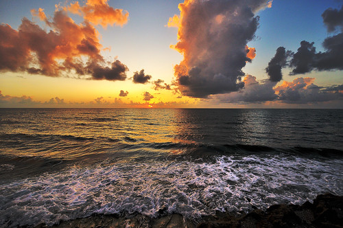 ocean light sunrise rocks break florida blowing shore jupiter lanscape
