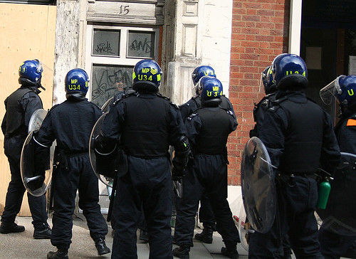 G20 - Riot police storm squat 