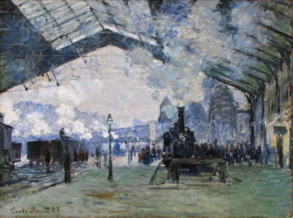 'Arrival of the Normandy Train, Gare Saint-Lazare' by Claude Monet: A blurry depiction of a tain entering a station, blues and black are used. 