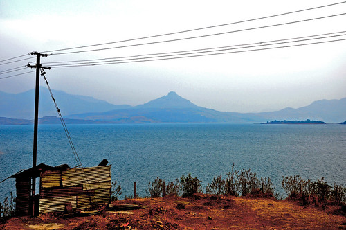 blue sea lake mountains abandoned nature beautiful electric composition contrast river landscape island seaside nikon scenery skies silent view dam pole hills wires shore rusted shack farah brokendown resilience blissful mondayblues icouldspendalifetimehere