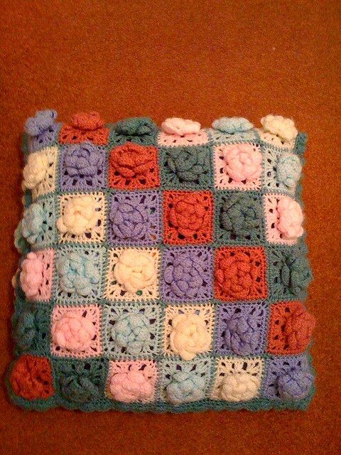Crocheted Granny Squares and Flowers.