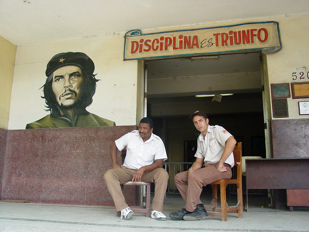 Guards with Che Guevara Mural - 