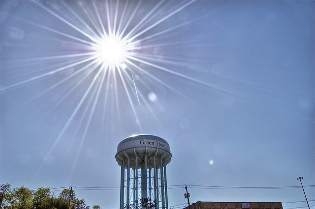Sun flare over the water tower