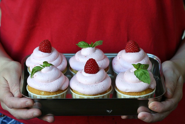 basil cream filled cupcakes with raspberry mousse frosting