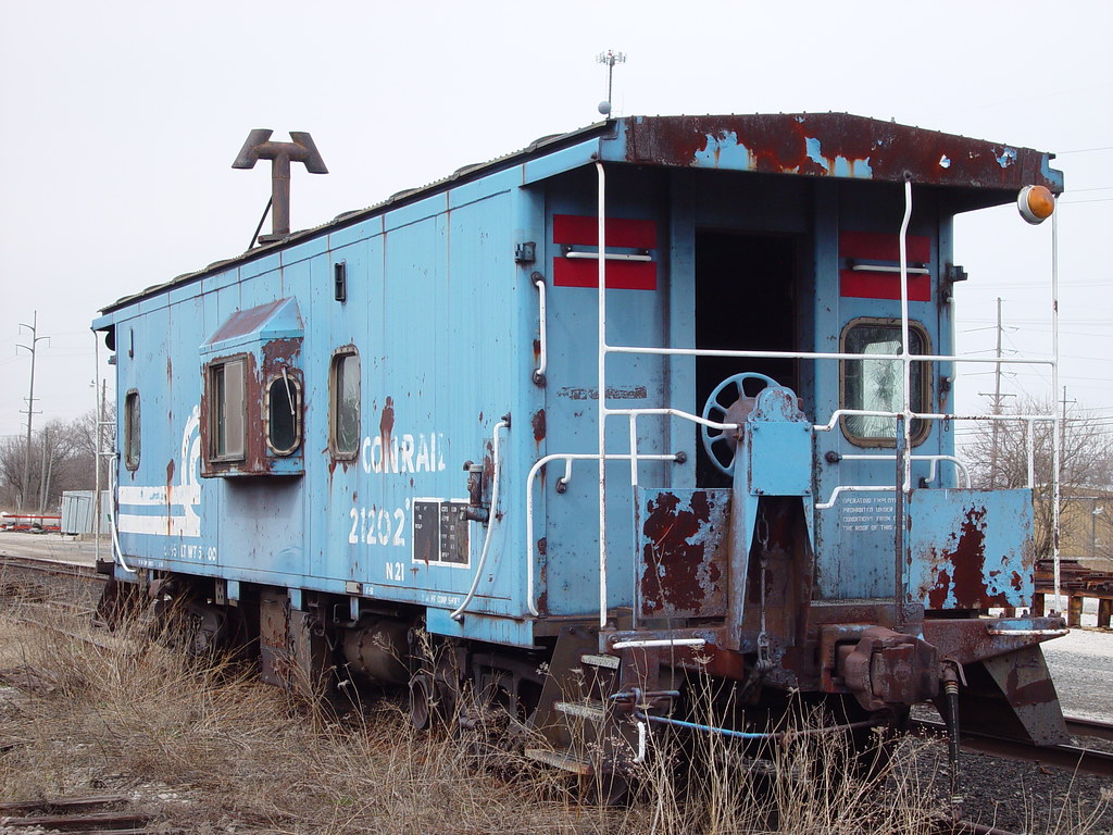 Conrail caboose | It's setting in a CSX repair area west of ...