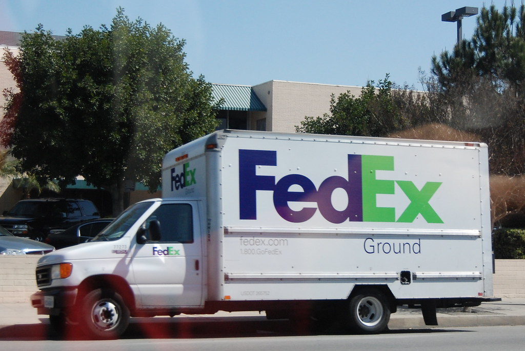 Fedex ground delivery - ford box truck.
