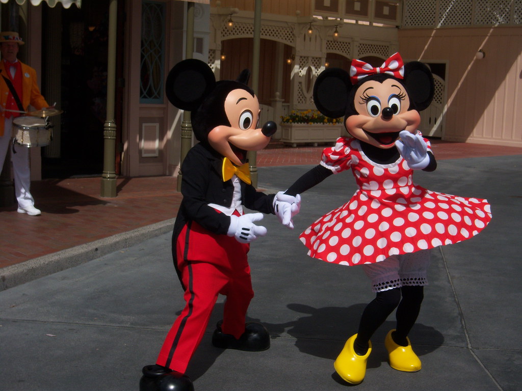 Mickey and Minnie dance to the music of the Main Street St… | Flickr