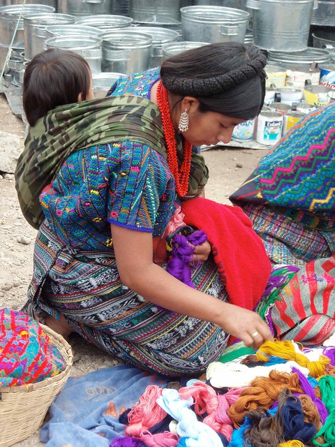 Woman and child in the market; Mujer y su niño en el mercado de San Miguel Chicaj, Baja Verapaz, Guatemala