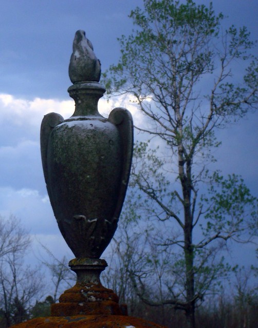 Urn and Storm Clouds