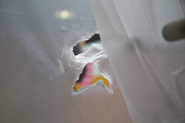 Behind the Plastic Sheeting