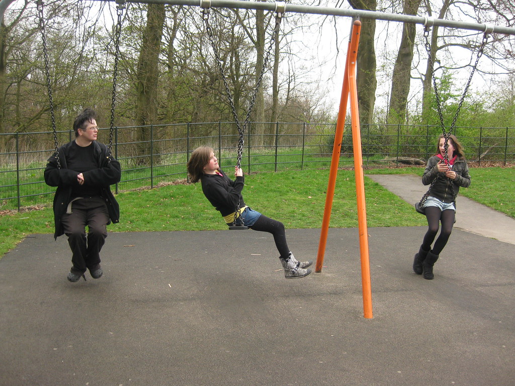 playing on the swings | In Heaton Park | Laurie Pink | Flickr