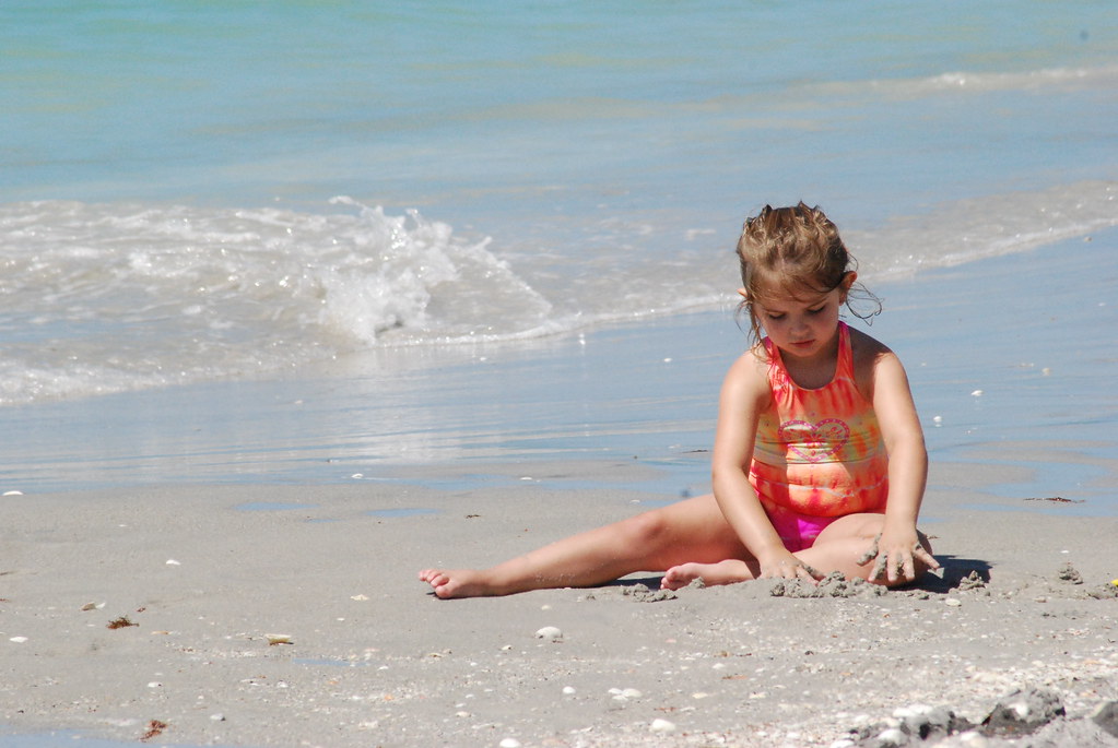 Little Girl Playing at the Beach - Venice Beach, Florida.